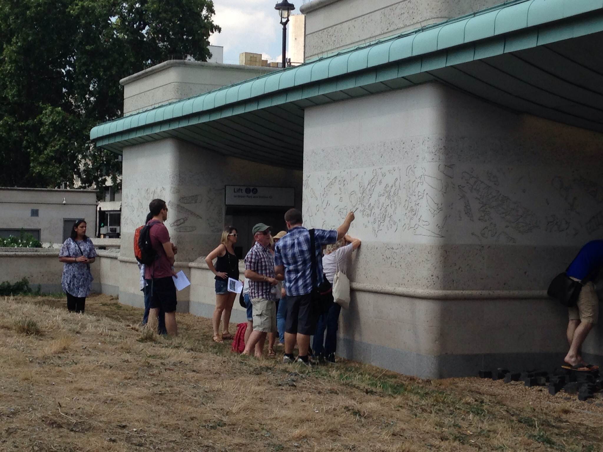 Teachers looking at the Roach from Portland used to construct Green Park Tube Station.